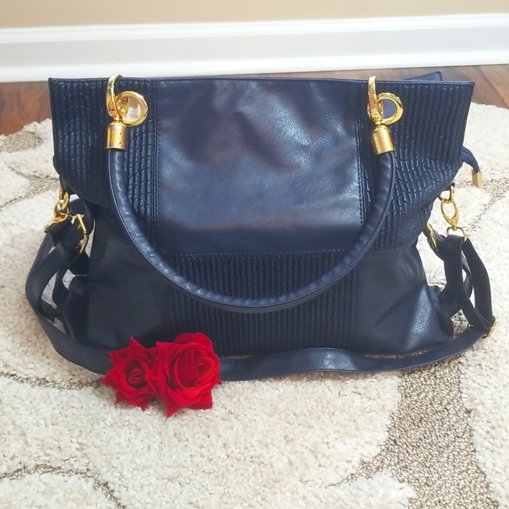 Beautiful navy blue vegan leather purse.